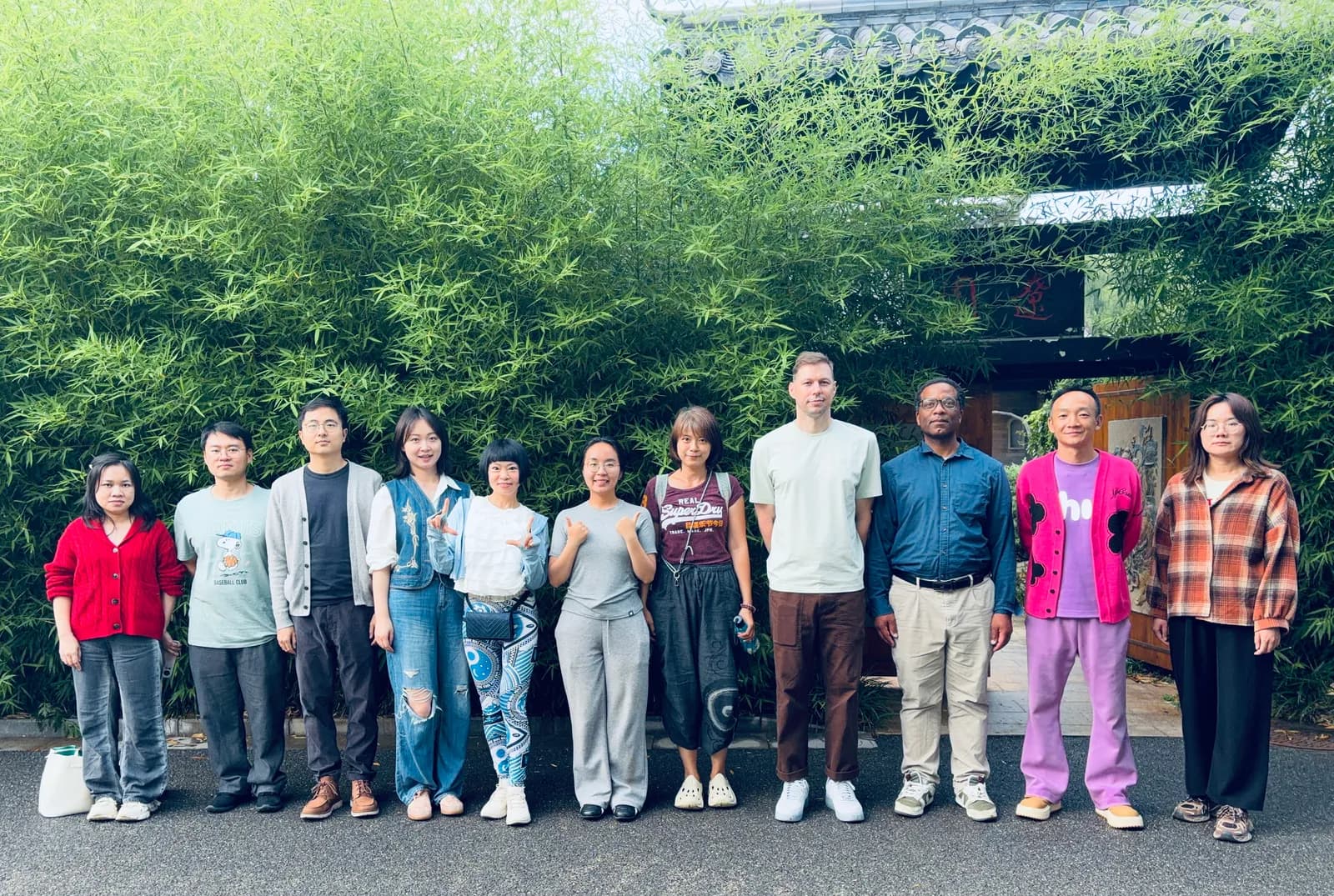A daytime meet-up lined up in front of the bamboo outside the venue